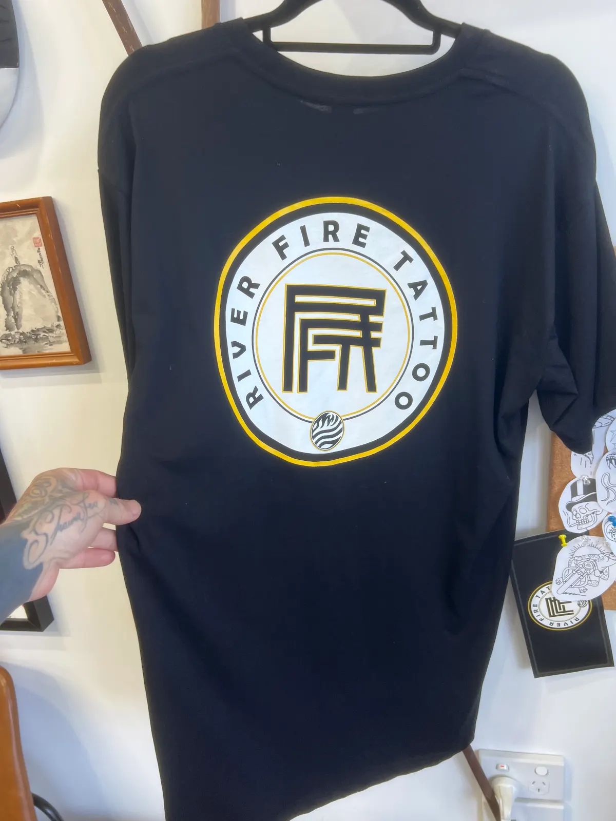 RFT Workers Support Tee, back — circular River Fire Tattoo emblem