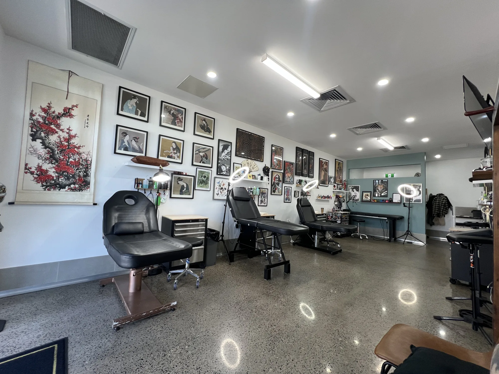 Tattoo bays at River Fire Tattoo with the bay lights switched on